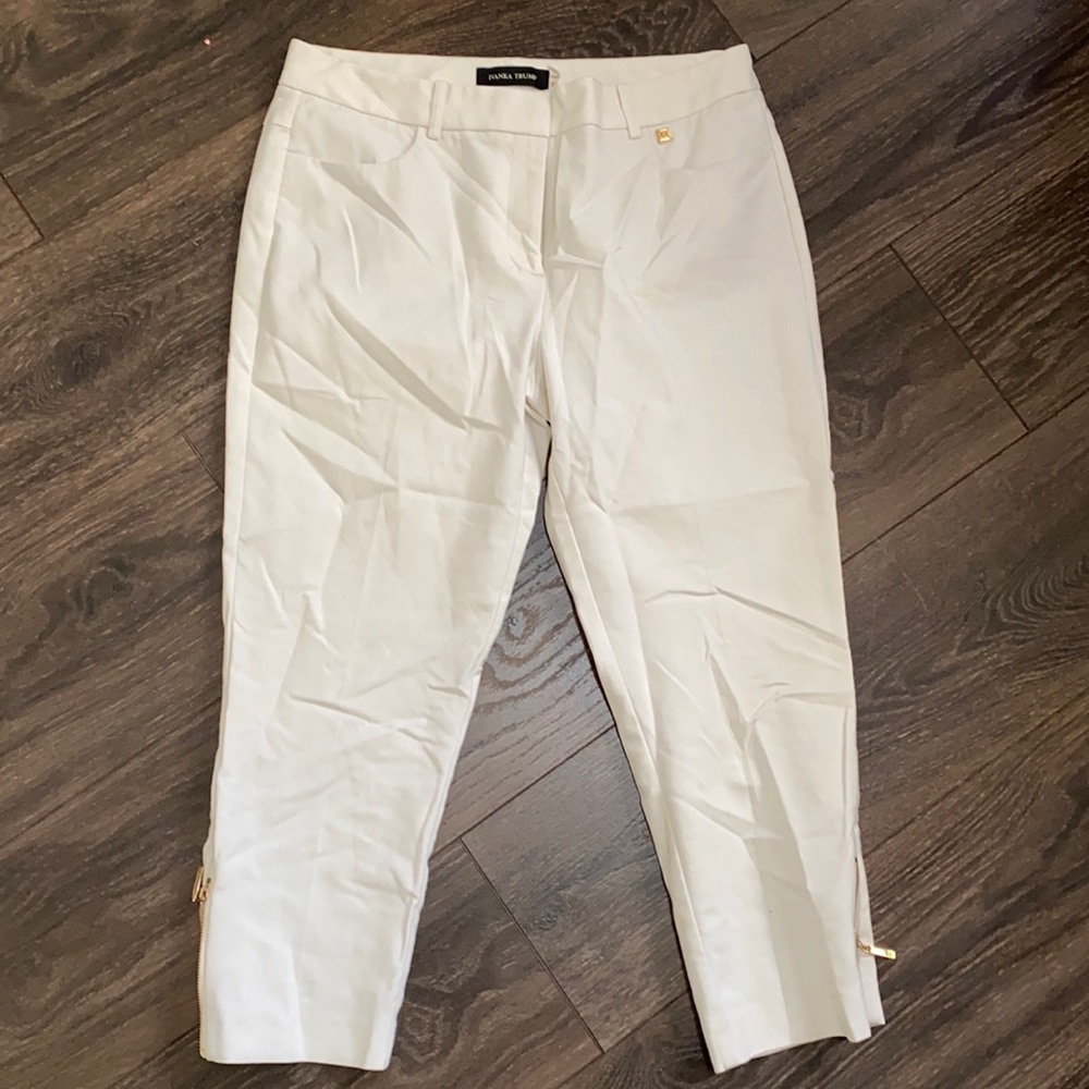 White pants with gold zipper